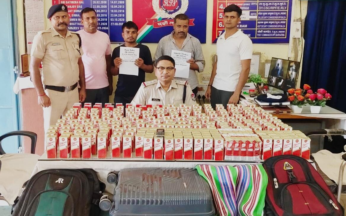 Major RPF crackdown at Barharwa Railway Station: Two smugglers from Begusarai arrested with 47 liters of foreign liquor.